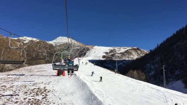 Going up with ski elevator in Foppolo ski resort, Italy — Stock Video