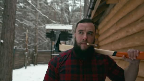 Walking lumberjack with axe — Stock Video