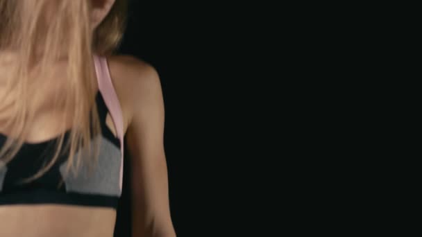Young fitness blond woman — Stock Video