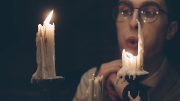 A close up of a person holding a candle — Stock video