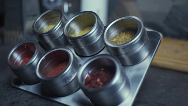 Steel pots with spice — Stockvideo