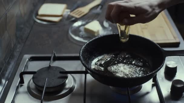 Omelette cooking on frying pan — Stockvideo