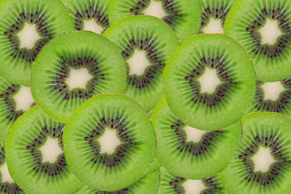 Închide textura feliilor kivi, fundal Kiwi — Fotografie, imagine de stoc