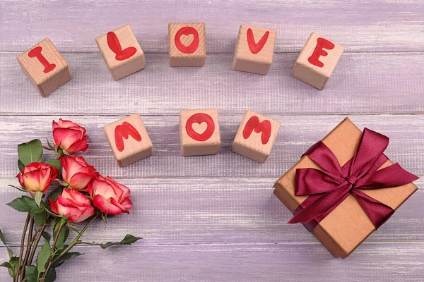 Festive composition for Mother's Day on wooden background — Stock Photo, Image