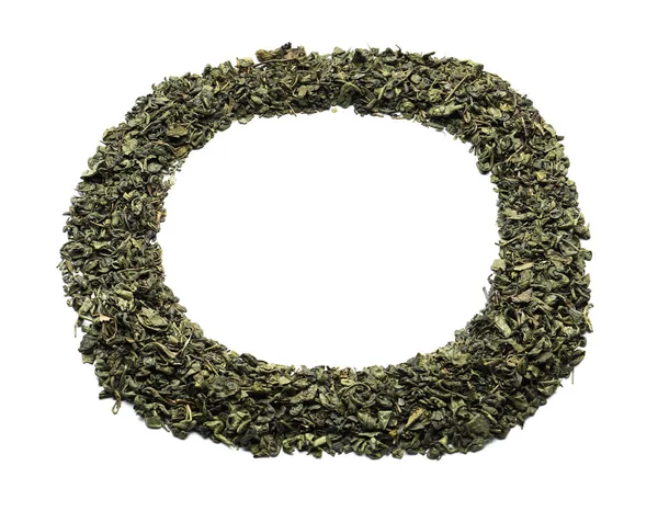 Circle made of dry green tea leaves on white background — Stock Photo, Image