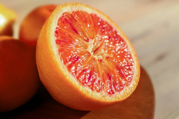 Half of tasty Sicilian orange on table, closeup — Stock Photo, Image