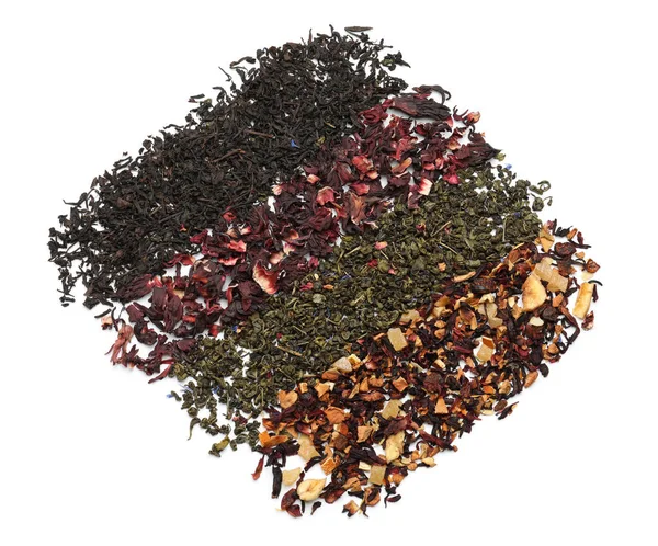 Különböző típusú száraz tea levelek, a fehér háttér — Stock Fotó