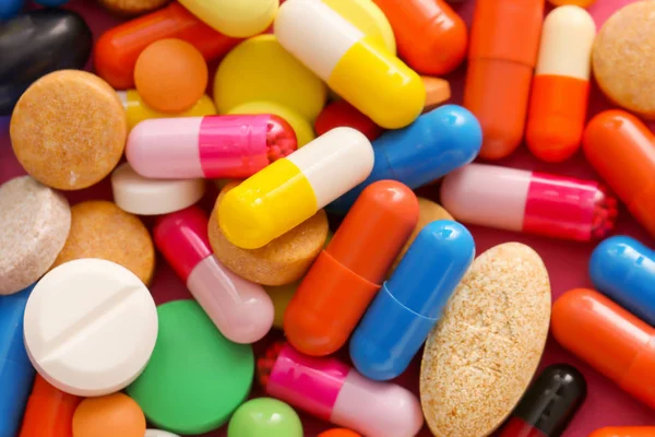 Different pills as background — Stock Photo, Image