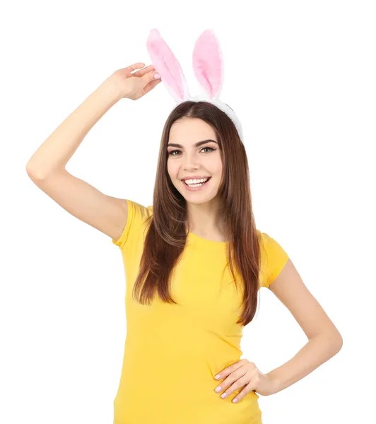 Beautiful young woman with Easter bunny ears on white background — Stock Photo, Image