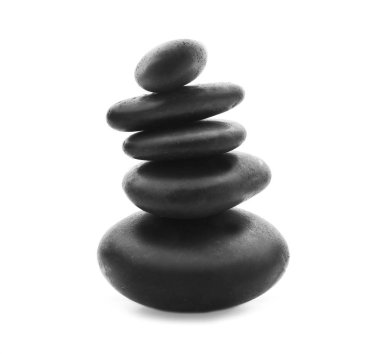 beyaz zemin üzerine spa taş yığını