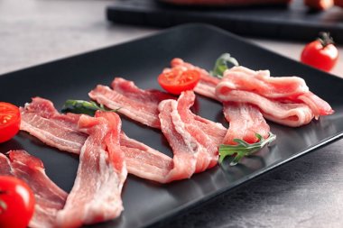 Rashers plaka, closeup üzerinde domuz pastırması