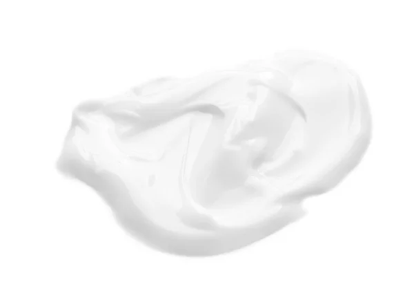 Échantillon de crème cosmétique sur fond blanc — Photo