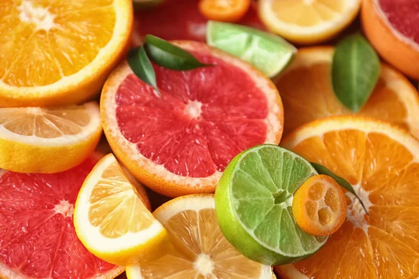 Slices of fresh citrus fruits, closeup Stock Image