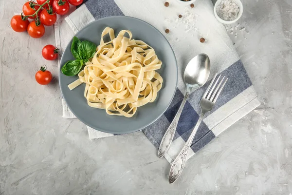 Plate of tasty pasta on table, top view — Stock Photo, Image
