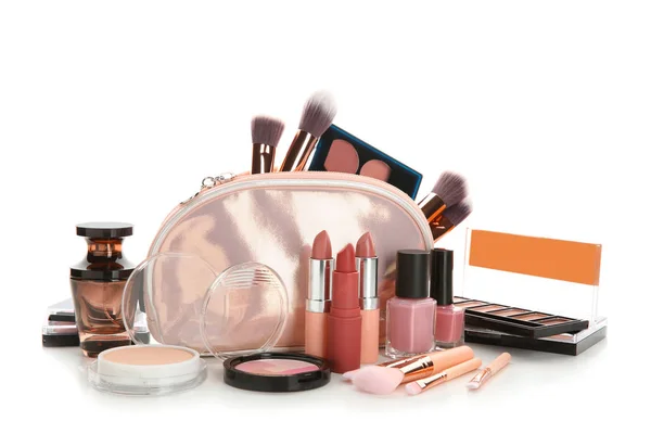 Make-up bag and set of decorative cosmetics on white background — Stock Photo, Image