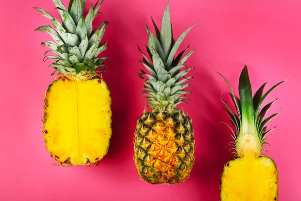 Fresh ripe pineapples on color background — Stock Photo, Image