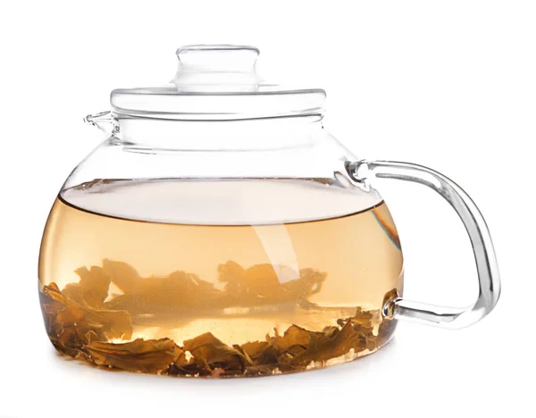 Glass teapot with delicious hot beverage on white background — Stock Photo, Image