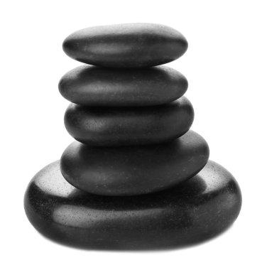 beyaz zemin üzerine spa taş yığını