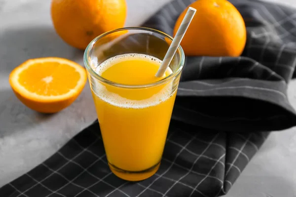 Glass of fresh citrus juice on table — Stock Photo, Image