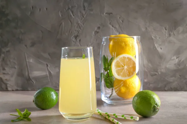 Glass of fresh citrus juice on table — Stock Photo, Image