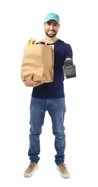 Delivery man holding paper bag with food and payment terminal on white background — Stock Photo, Image
