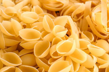 Arka plan, closeup olarak pişmemiş makarna