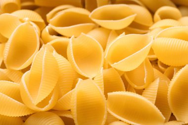 Arka plan, closeup olarak pişmemiş makarna