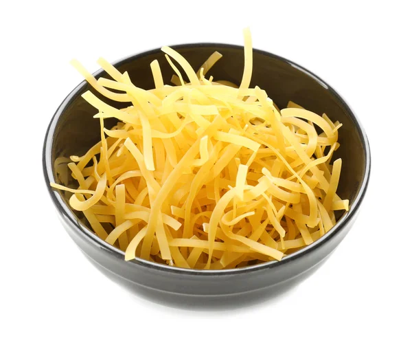 Bowl with raw pasta on white background — Stock Photo, Image