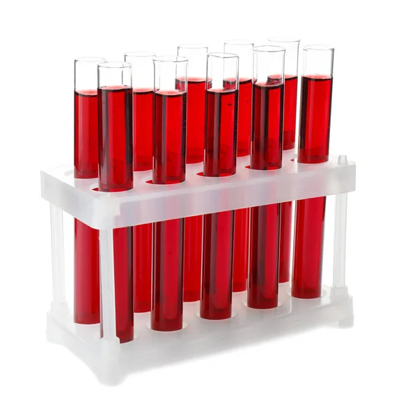 Tubos de ensaio com amostras de sangue no suporte sobre fundo branco — Fotografia de Stock