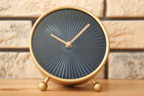 Modern clock on wooden table. Time management concept — Stock Photo, Image