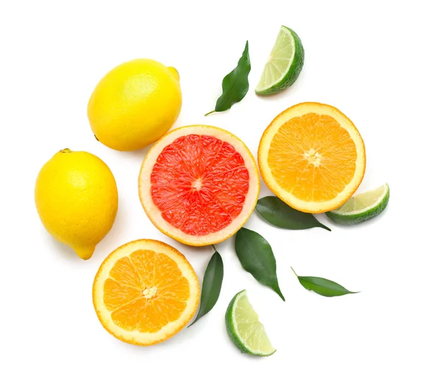 Composition with sliced citrus fruits on white background — Stock Photo, Image