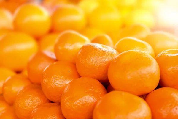 Many ripe tangerines, closeup. Fresh citrus fruit — Stock Photo, Image