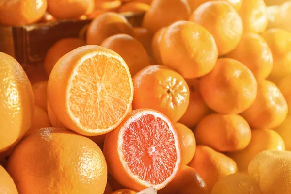Many ripe citrus fruits, closeup — Stock Photo, Image