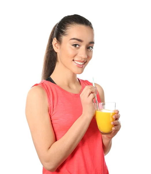 Beautiful young woman with glass of citrus juice on white background — Stock Photo, Image