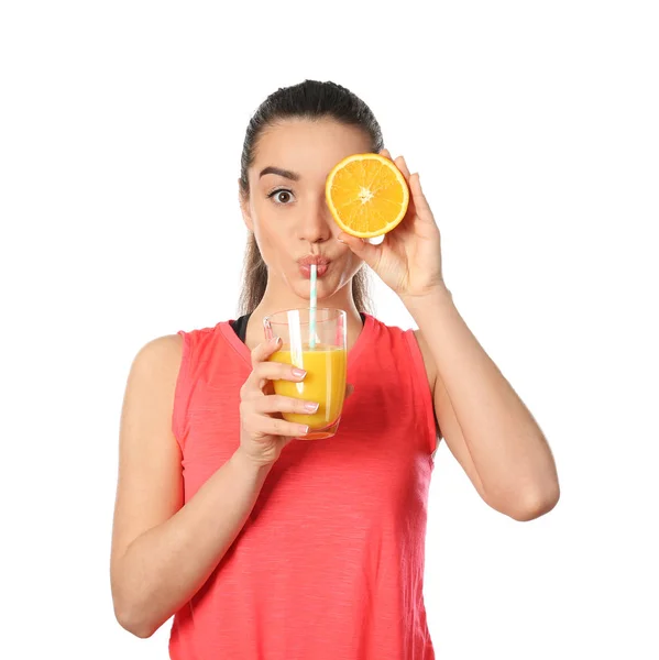 Beautiful young woman with glass of citrus juice and fruit on white background — Stock Photo, Image