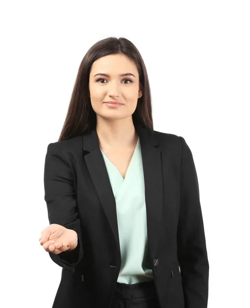 Young businesswoman holding something on white background — Stock Photo, Image
