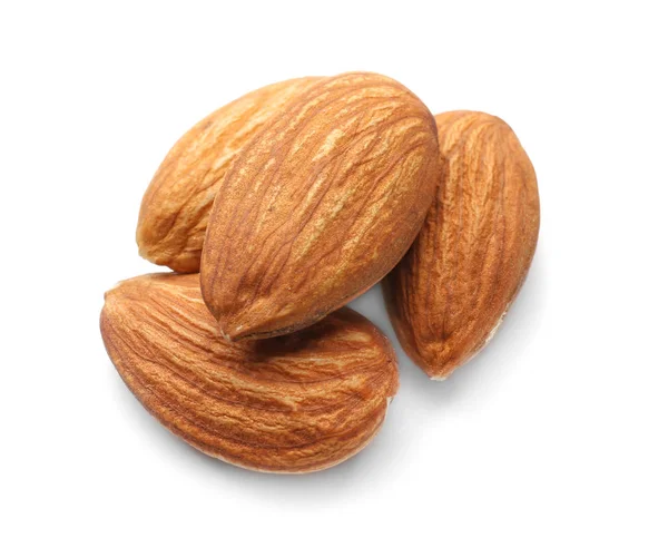 Tasty almond nuts on white background — Stock Photo, Image