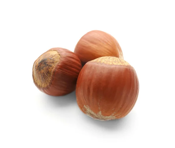 Tasty hazelnuts on white background — Stock Photo, Image