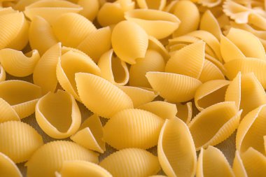 Arka plan, closeup olarak pişmemiş makarna