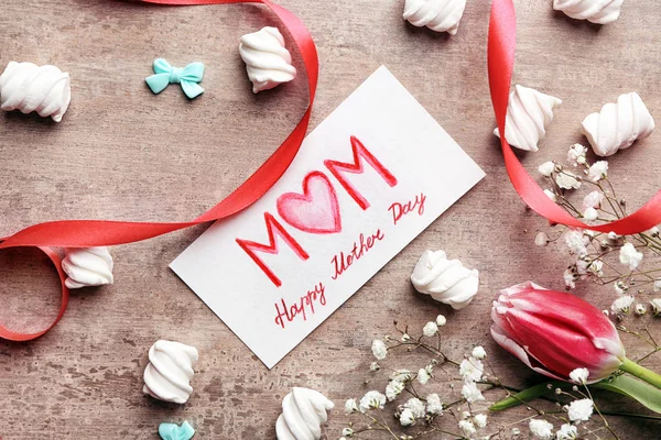 Beautiful composition with handmade card for Mother\'s Day on table