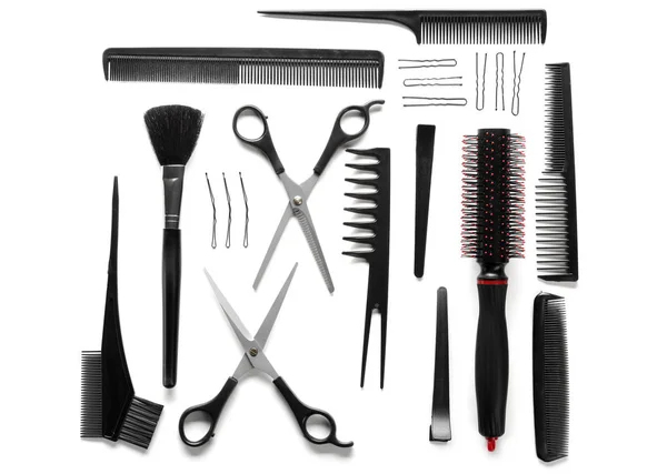 Professional hairdresser's tools on white background, top view — Stock Photo, Image