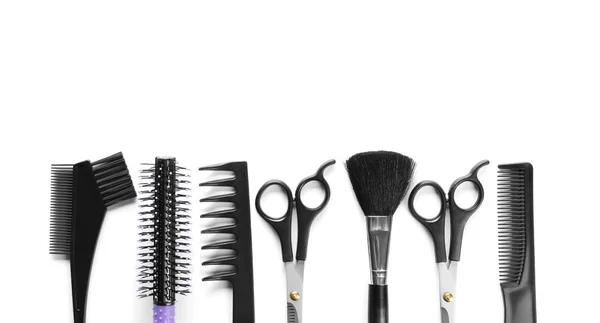 Professional hairdresser's tools on white background, top view — Stock Photo, Image