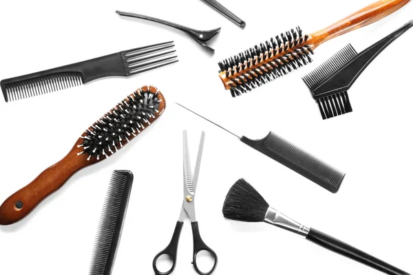 Professional hairdresser's tools on white background, top view — Stock Photo, Image