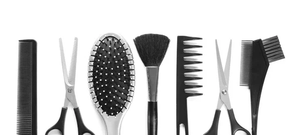 Professional hairdresser's tools on white background, top view — Stock Photo, Image