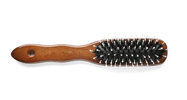 Hairbrush on white background, top view. Professional hairdresser's equipment — Stock Photo, Image