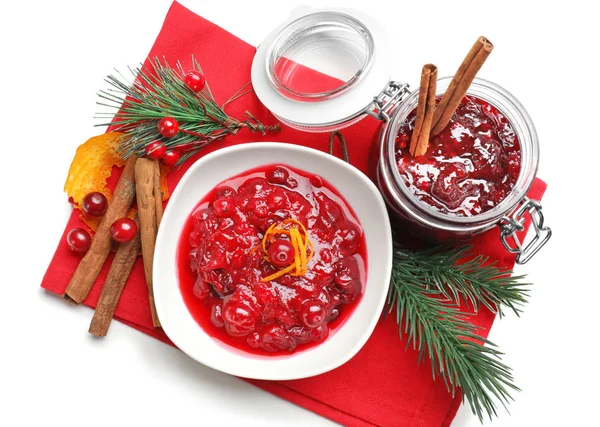 Flat lay composition with cranberry sauce on red cloth — Stock Photo, Image
