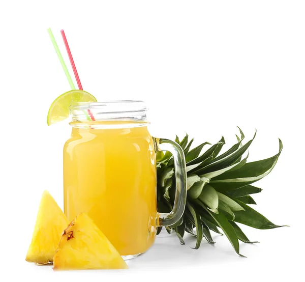 Mason jar of sweet juice with pineapple slices on white background — Stock Photo, Image