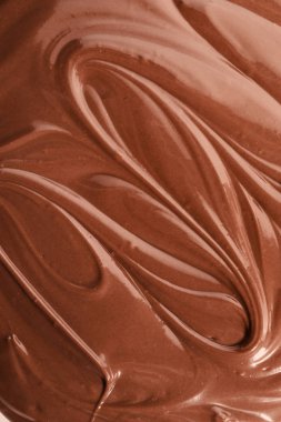 Arka plan olarak lezzetli eritilmiş çikolata