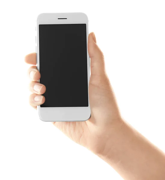 Young woman holding smartphone on white background — Stock Photo, Image