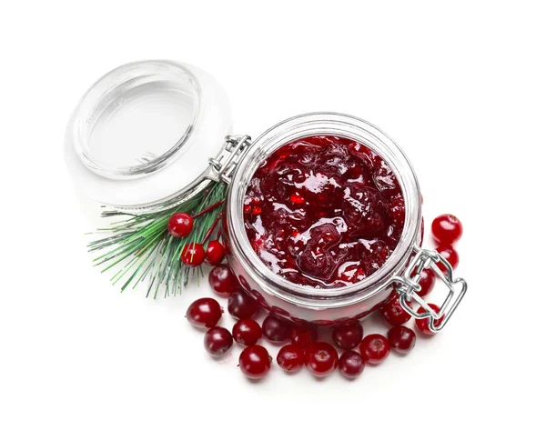 Jar with tasty cranberry sauce on white background, top view — Stock Photo, Image